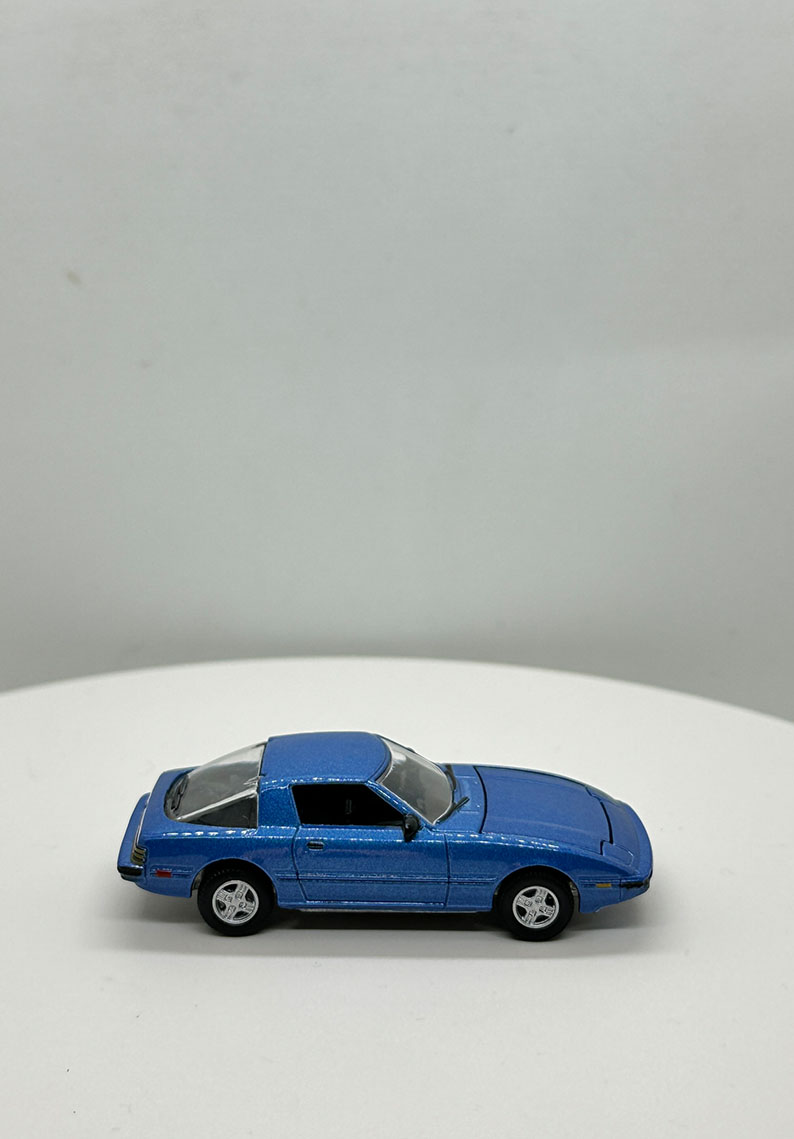 JOHNNY LIGHTNING 1982 MAZDA RX-7 AZUL - SUELTO